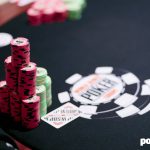 2023 WSOP table with chips and cards