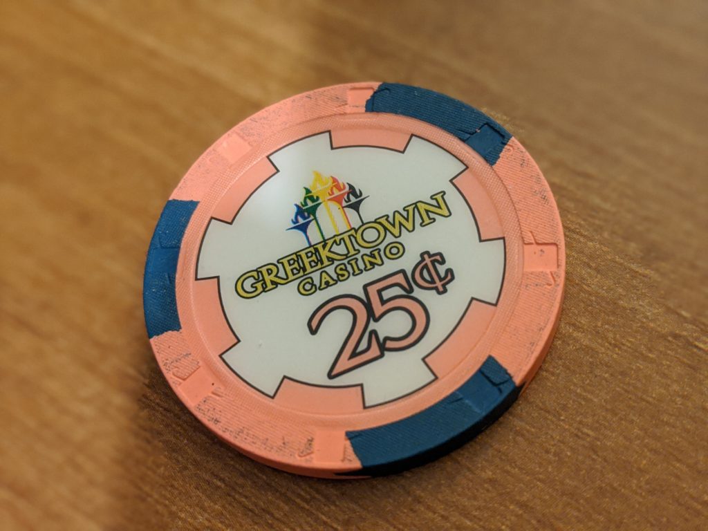 Orange 25-cent Greektown casino chip